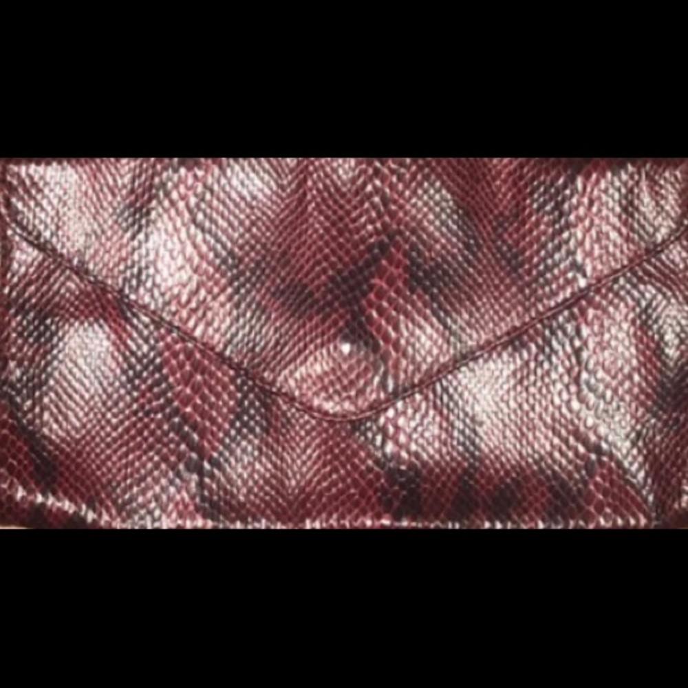 maroon snake skin clutch